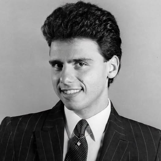 Young Herbie J Pilato in a suit and tie